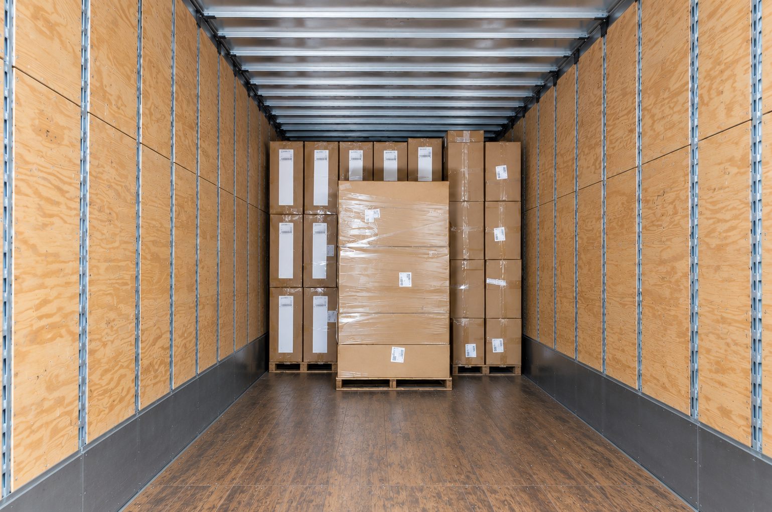 Packed cabinets at the shipping station